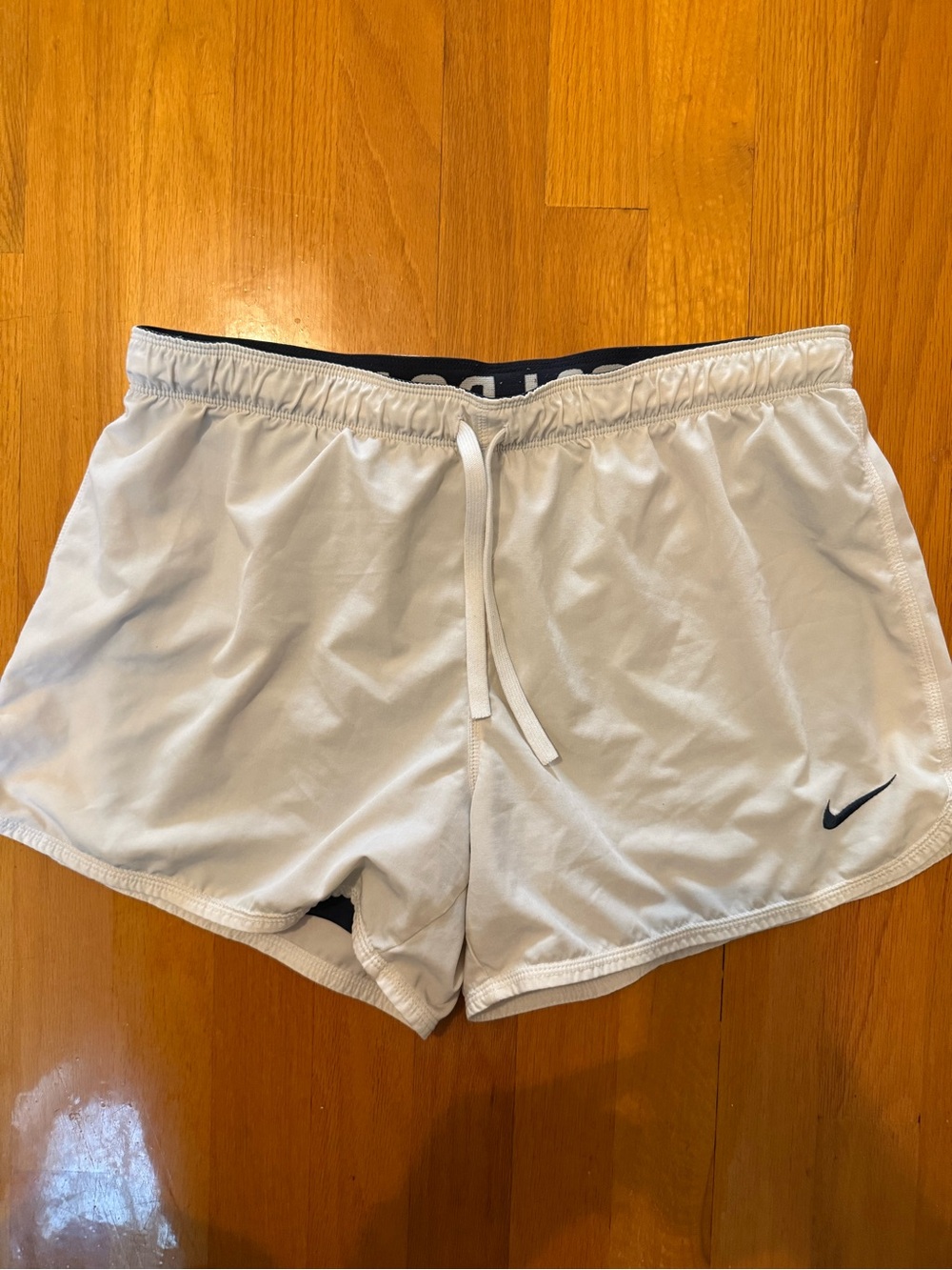 Nike Women’s White Athletic Running Shorts with Black Swoosh